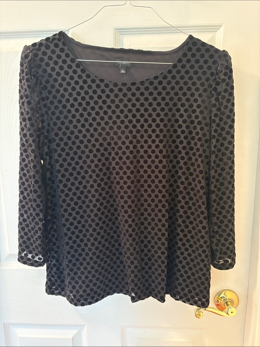Black polka dot blouse